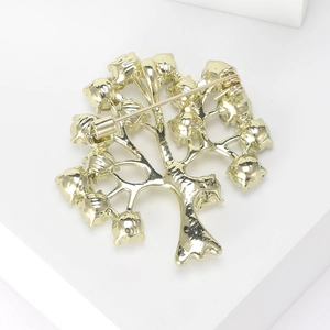 Broche arbre de fortune dorée avec strass et fermeture à épingle de sûreté au dos