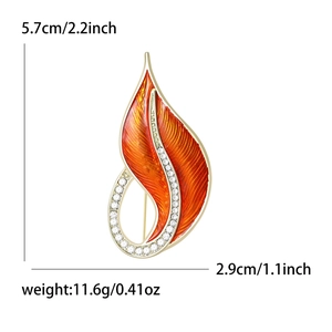 Elegant orange leaf brooch with gold edges and crystal rhinestones, 5.7cm x 2.9cm dimensions