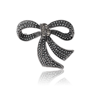Vintage style black bow brooch with grey pearls and sparkling zircon center in dark metal