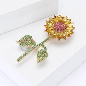 Exquisite sunflower brooch with colorful rhinestones on a gold-tone base for women
