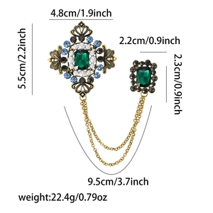 Baroque style rhinestone tassel chain brooch with green emerald stones and vintage alloy base