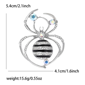 Silver crystal spider brooch with black enamel stripes and rainbow rhinestones for suits