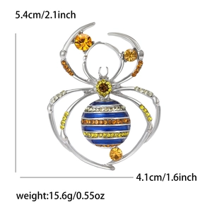 Detailed size view of silver spider brooch with colorful rhinestones and blue enamel