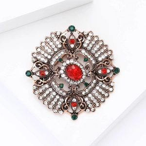 Vintage Baroque alloy brooch with red crystal and rhinestones in Victorian royal style