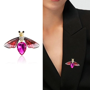 Exquisite crystal bee brooch with magenta stone on black blazer for women's fashion
