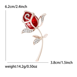 Eleganter roségoldener Blumenbroschen mit roter Kristallknospe und funkelnden Strass