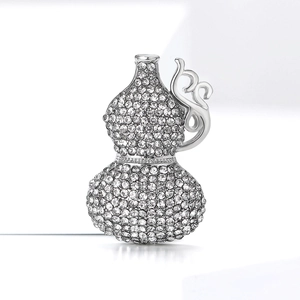 Macro shot of high-end hulu brooch with sparkling rhinestones and silver-toned finish