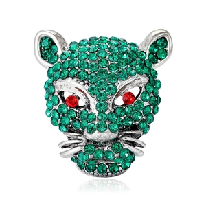 Exquisite handmade leopard head brooch featuring green crystals and red gemstone eyes