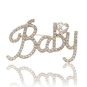 Broche dorée Baby pour femme ornée de strass brillants et d'un cristal en cœur