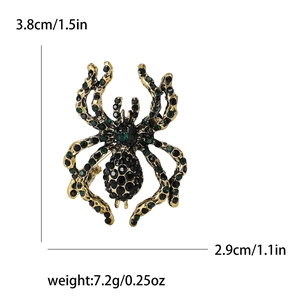 Retro spider brooch with green and black rhinestones on gold alloy base