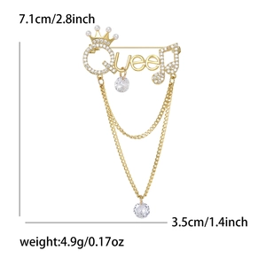 Elegant gold Queen brooch with zircons and tassels, measures 7.1cm x 3.5cm and weighs 4.9g