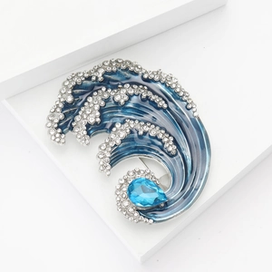 Exquisite enamel ocean wave brooch with blue water drop rhinestone and silver accents