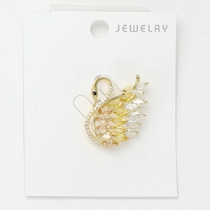 Macro shot of luxury swan brooch with gradient marquise zircons and fine crystal pavé