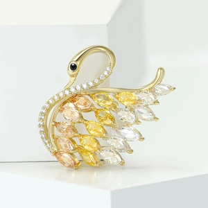 Luxury gold swan brooch with sparkling champagne zircon stones and marquise cut crystals
