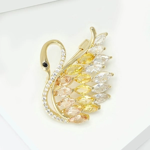 Luxurious swan brooch with gradient yellow marquise zircon wings and gold-plated finish