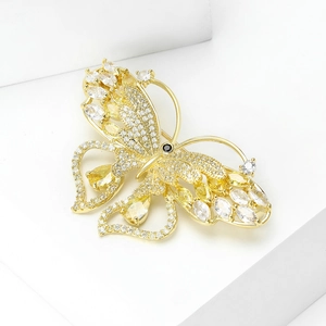 Exquisite gold butterfly brooch with micro-pave zircons and yellow gemstones