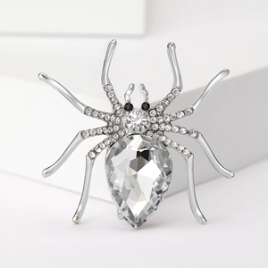 Sparkling silver spider brooch with rhinestones and pear-shaped crystal for Halloween