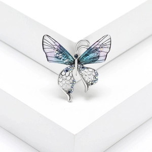 Broche papillon élégante en argent avec ailes dégradées bleu violet et cristaux
