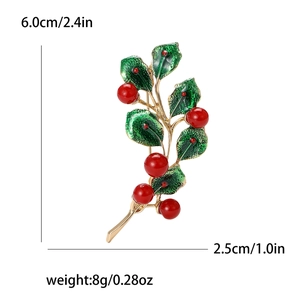 Enamel holly berry brooch with green leaves and red pearls in gold finish for women