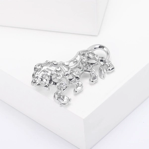 Detail of silver hollow tiger brooch with sparkling zircons and dual-use pendant design
