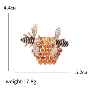 Broche de abeja y panal esmaltado dorado con brillantes diamantes de imitación blancos