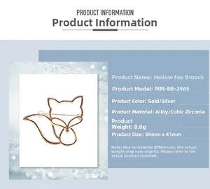 Détail d'une broche renard dorée ajourée avec strass et dimensions du produit