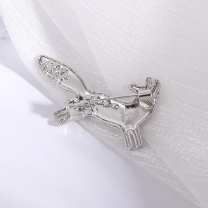 Detailed back view of a silver fox brooch showing the sturdy alloy safety pin fastener