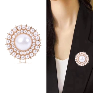 Elegant gold pearl brooch featuring radial multi-layer design for fashion suits