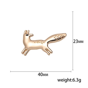 Minimalist gold alloy fox brooch with detailed texture in a leaping pose