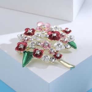 Detail of enamel hydrangea brooch with colorful flowers and rhinestones on gold stem