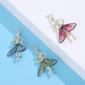 Elegant dragonfly elf brooches in blue, green, and pink with sparkling crystal details