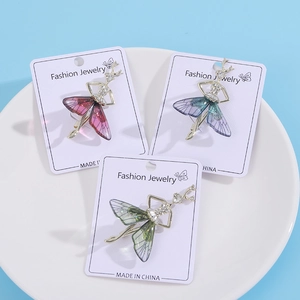 Elegant ballet fairy brooches with sparkling butterfly wings in vibrant gradient colors