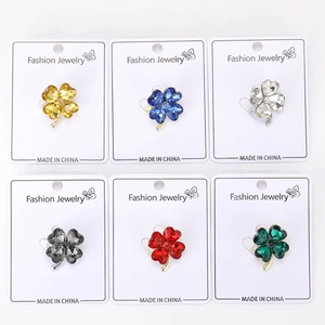 Detailed set of six crystal clover brooches in yellow, blue, red, green, grey, and clear colors
