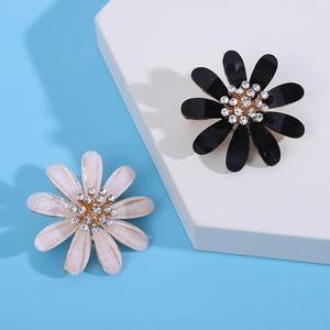 Elegant floral brooch with rhinestones in black and pearl white for summer coats