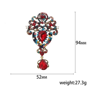 Broche vintage estilo palacio con diamantes de imitación y colgante de gota roja