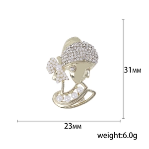 Elegant vintage woman portrait brooch with sparkling rhinestones and white pearls