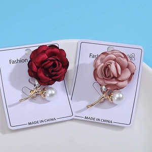 Elegant satin rose brooches with rhinestones and pearls in red and pink colors