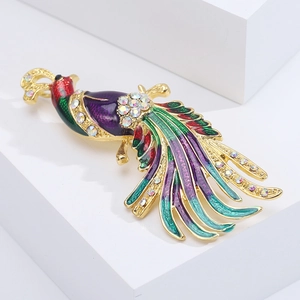 Vintage colorful peacock feather brooch in gold with enamel and sparkling crystals