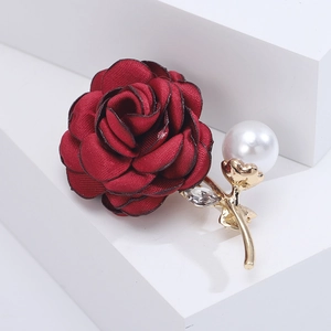 Elegant deep red fabric flower brooch with white pearl and rhinestone accents on gold stems