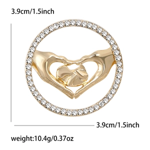 Broche dorée mains de nouveau-né avec strass, diamètre 3,9 cm et poids de 10,4 g