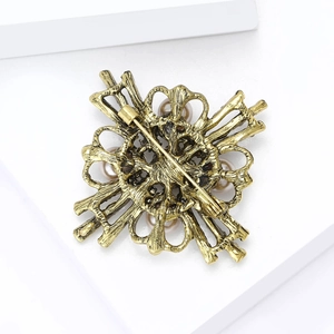 Baroque style pearl brooch pin in vintage gold finish with cross symmetrical design