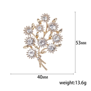 Élégante broche bouquet en strass et alliage doré mesurant 53 mm sur 40 mm de large