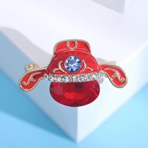 Detail of Chinese opera headwear brooch with red enamel, blue gem and white crystals