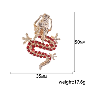 Fashionable dragon brooch with red rhinestones in gold finish for men and women