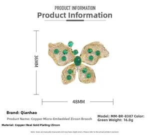 Spécifications de taille pour une broche papillon plaquée or avec zircons verts