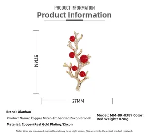 Vue technique montrant les dimensions 57x27mm pour la broche corail en perles d'or