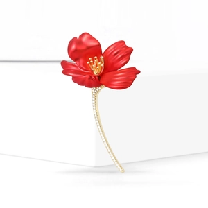 Elegant red hibiscus flower brooch with gold plating and cubic zirconia accents