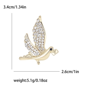 Broche pigeon dorée avec strass scintillants et dimensions détaillées 3.4cm x 2.6cm