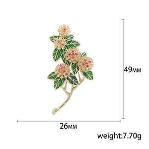 Elegant floral brooch with green enamel leaves and pink cubic zirconia micro-pave crystals