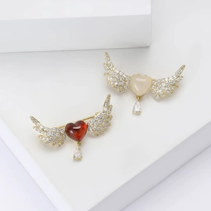 Elegant gold angel wing heart brooches with white zircons and hanging teardrop crystals